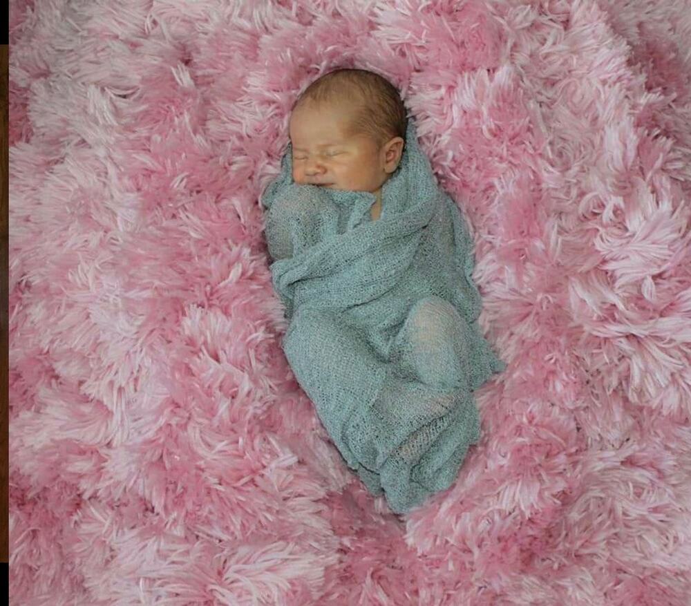 Stretchy knit newborn wrap